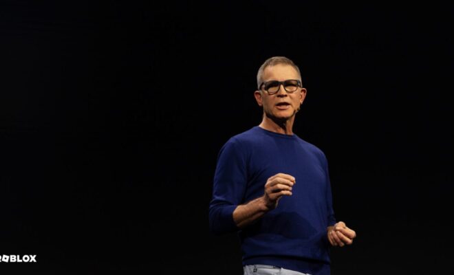 Roblox CEO and Founder David Baszucki speaking at the Roblox Developers Conference black background